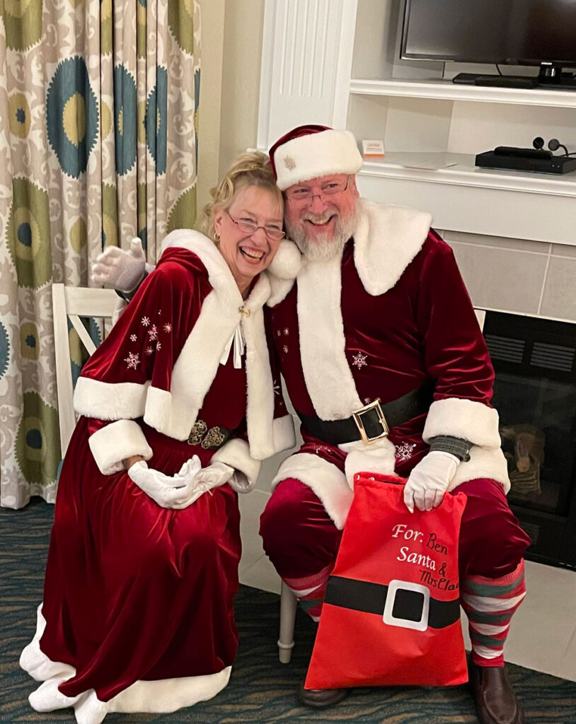 Mr and Mrs Young dressed up as Santa and Mrs Clause